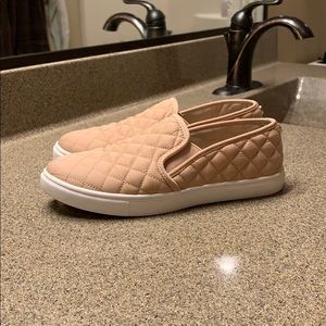 Steve Madden Ecentrcq Slip Ons in a tan pink